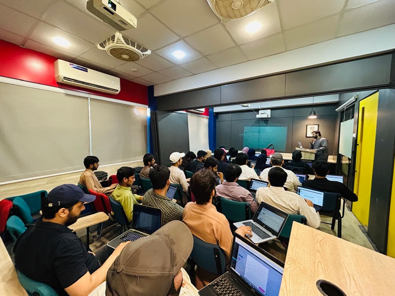 Students attending NAVTTC free training at Edify College of IT in Faisalabad