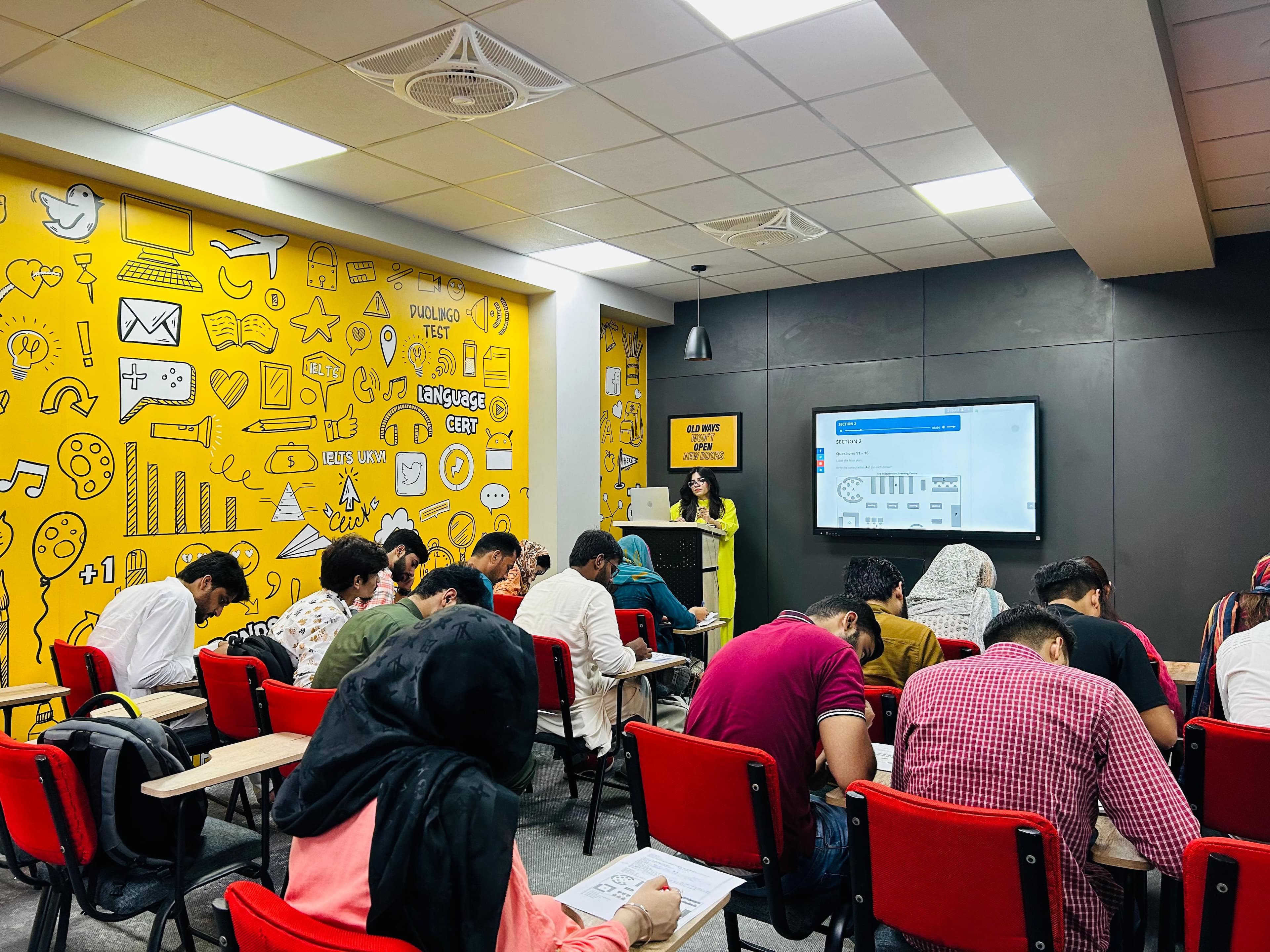 Students attending a classroom lesson at Edify College of IT in Faisalabad